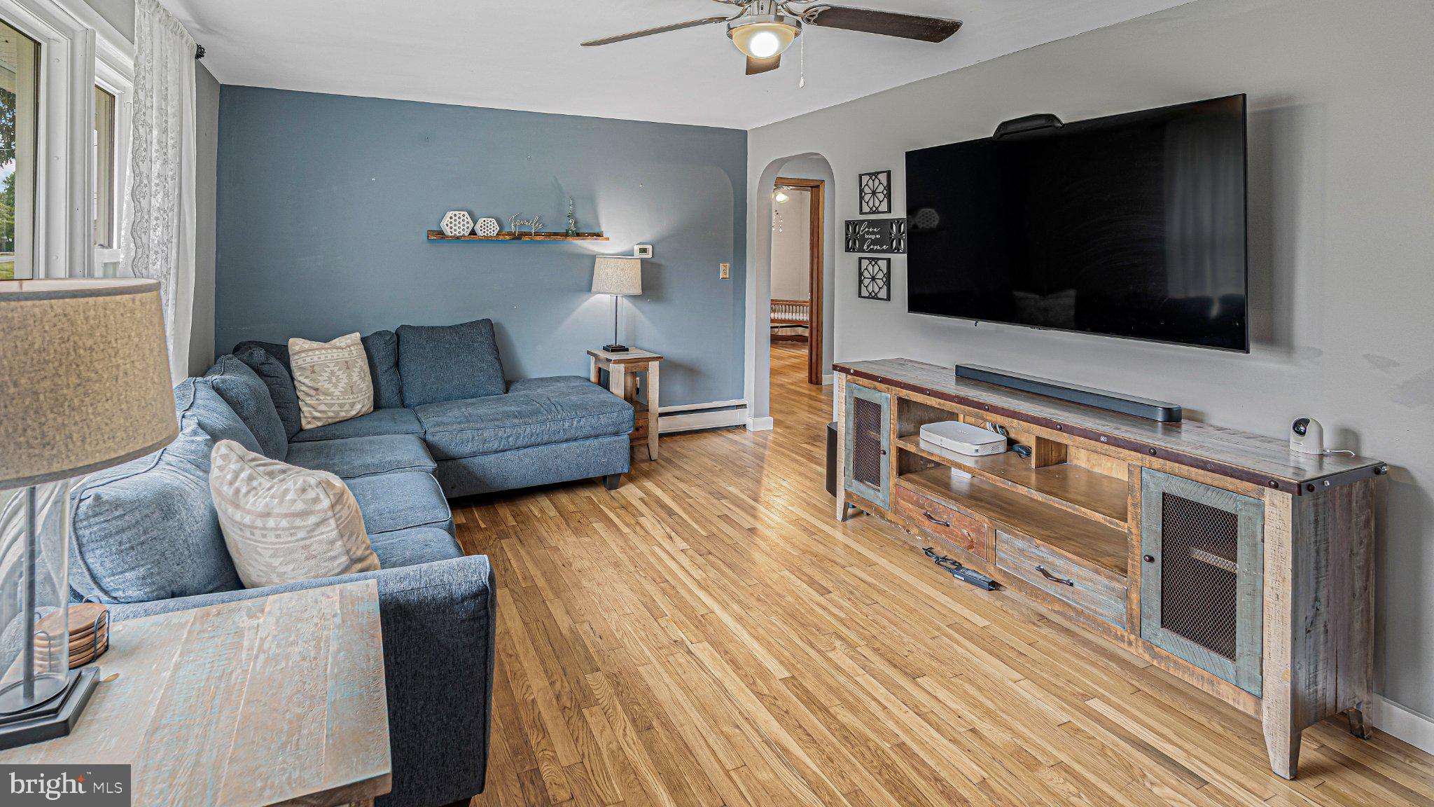16 Garrison Road Elmer, NJ 08318 - Photo 4 of 17 Modern living space with warm tones.