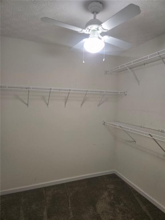 22 Windcrest Keep Covington, GA 30016 - Photo 23 of 32 a view of a room with racks on the wall