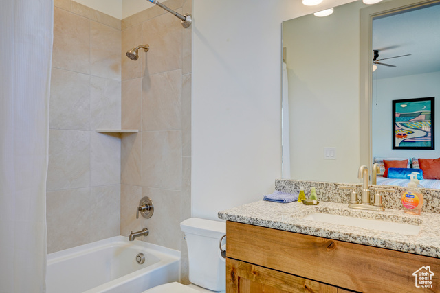 1329 Paseos Street Washington, UT 84780 - Photo 8 of 35 Full bathroom with shower / tub combo, ensuite bathroom, vanity, and ceiling fan