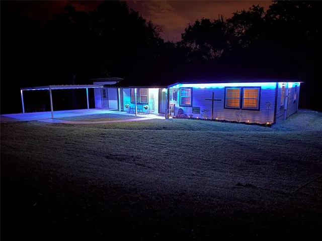a view of house with outdoor space