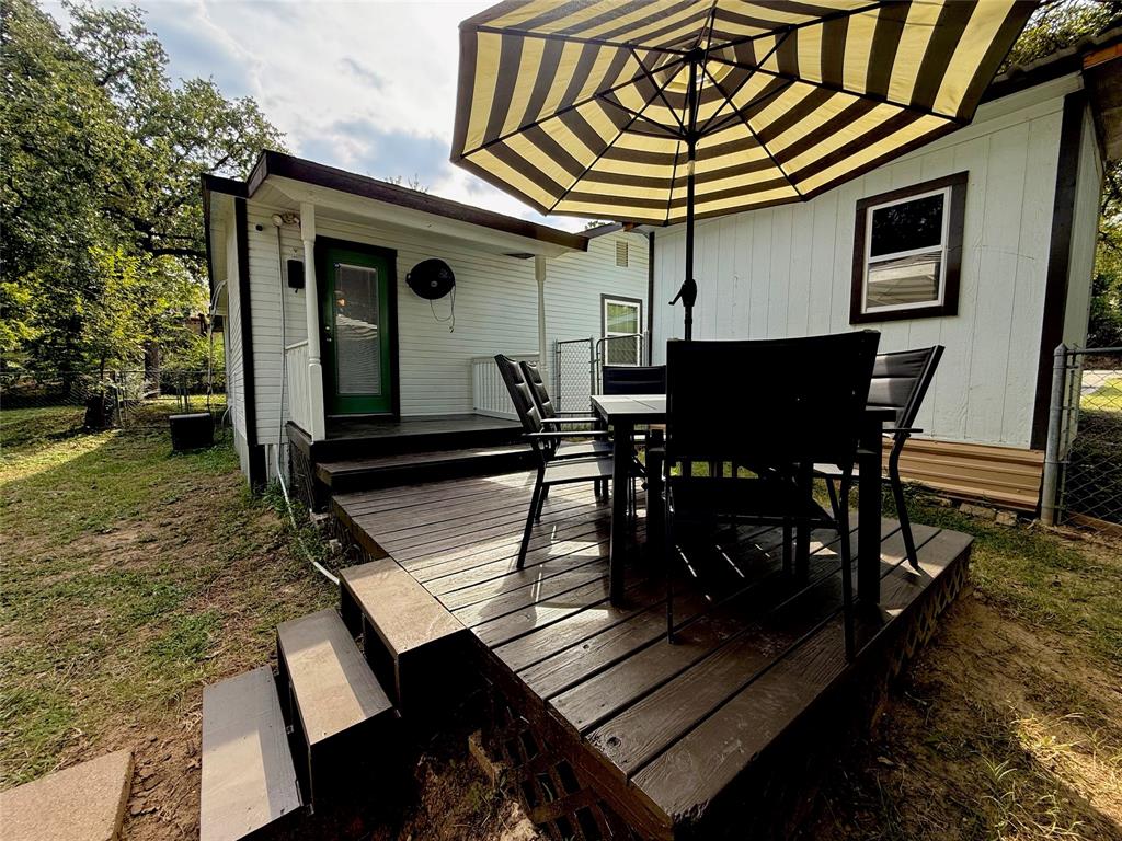 532 Marquette Avenue Azle, TX 76020 - Photo 7 of 32 a view of a chairs and table in the patio