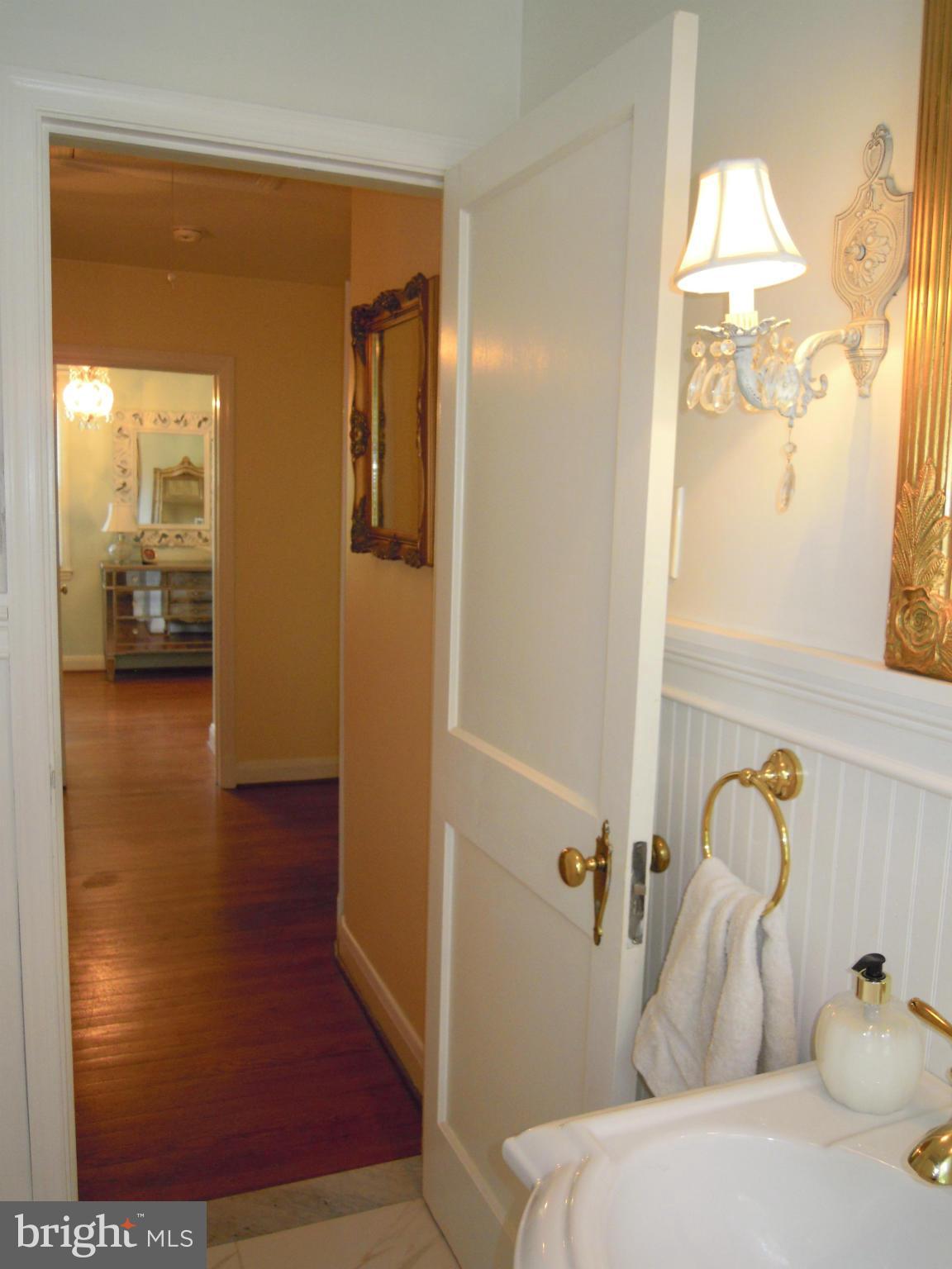 229 Blenheim Road Baltimore, MD 21212 - Photo 14 of 29 a bathroom with a tub and shower