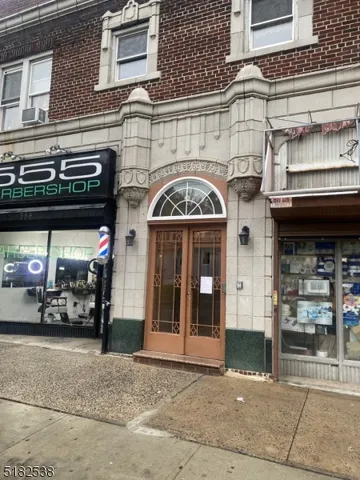 a view of a building with car windows