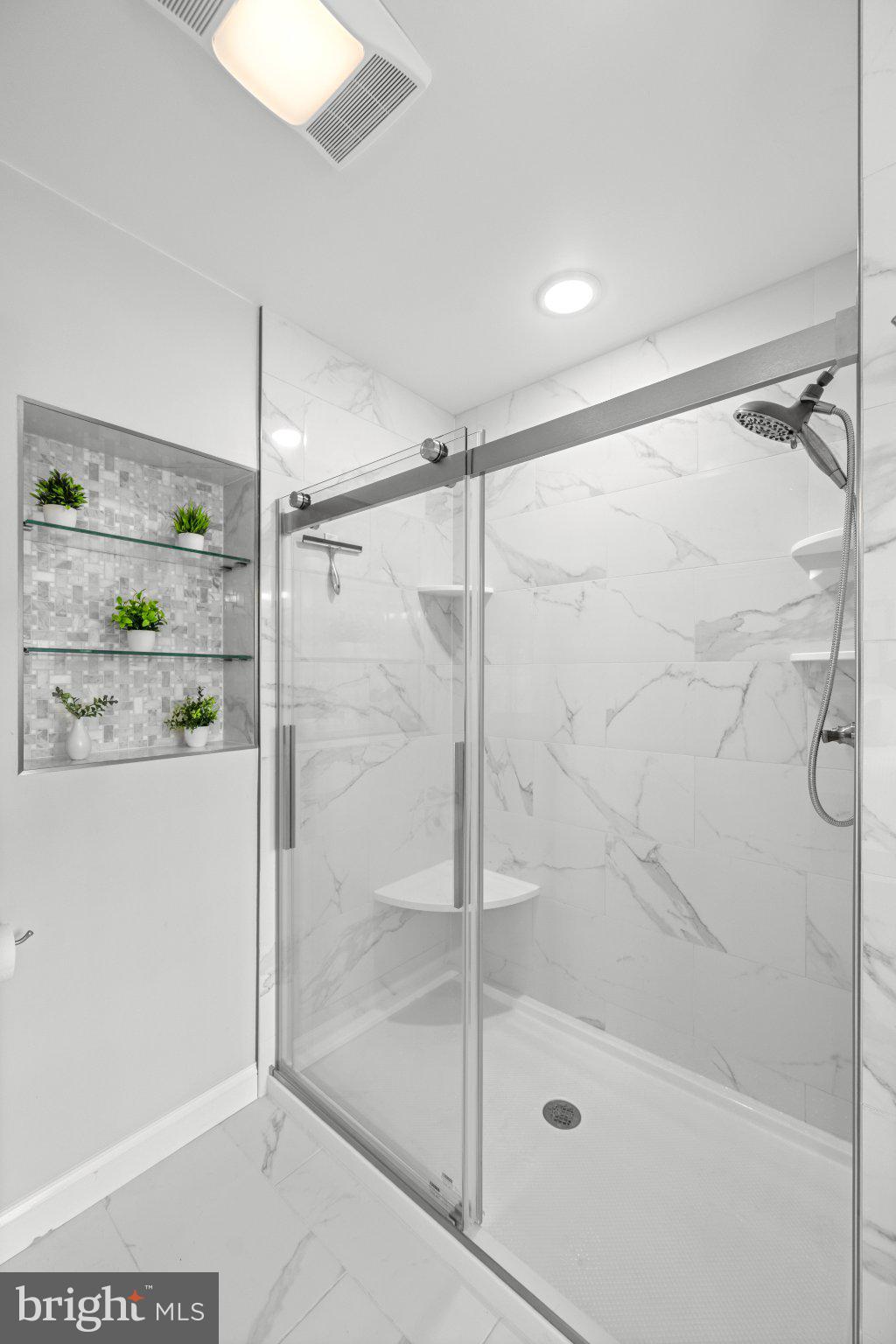 418 Church Road Hatfield, PA 19440 - Photo 27 of 53 Sleek modern shower with elegant tiles.