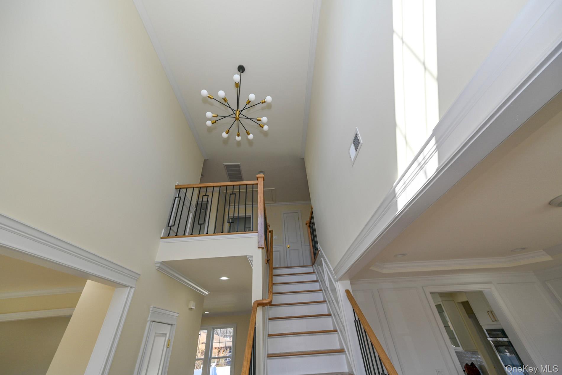 1772 Rose Street Merrick, NY 11566 - Photo 11 of 35 a view of entryway and hall with wooden floor
