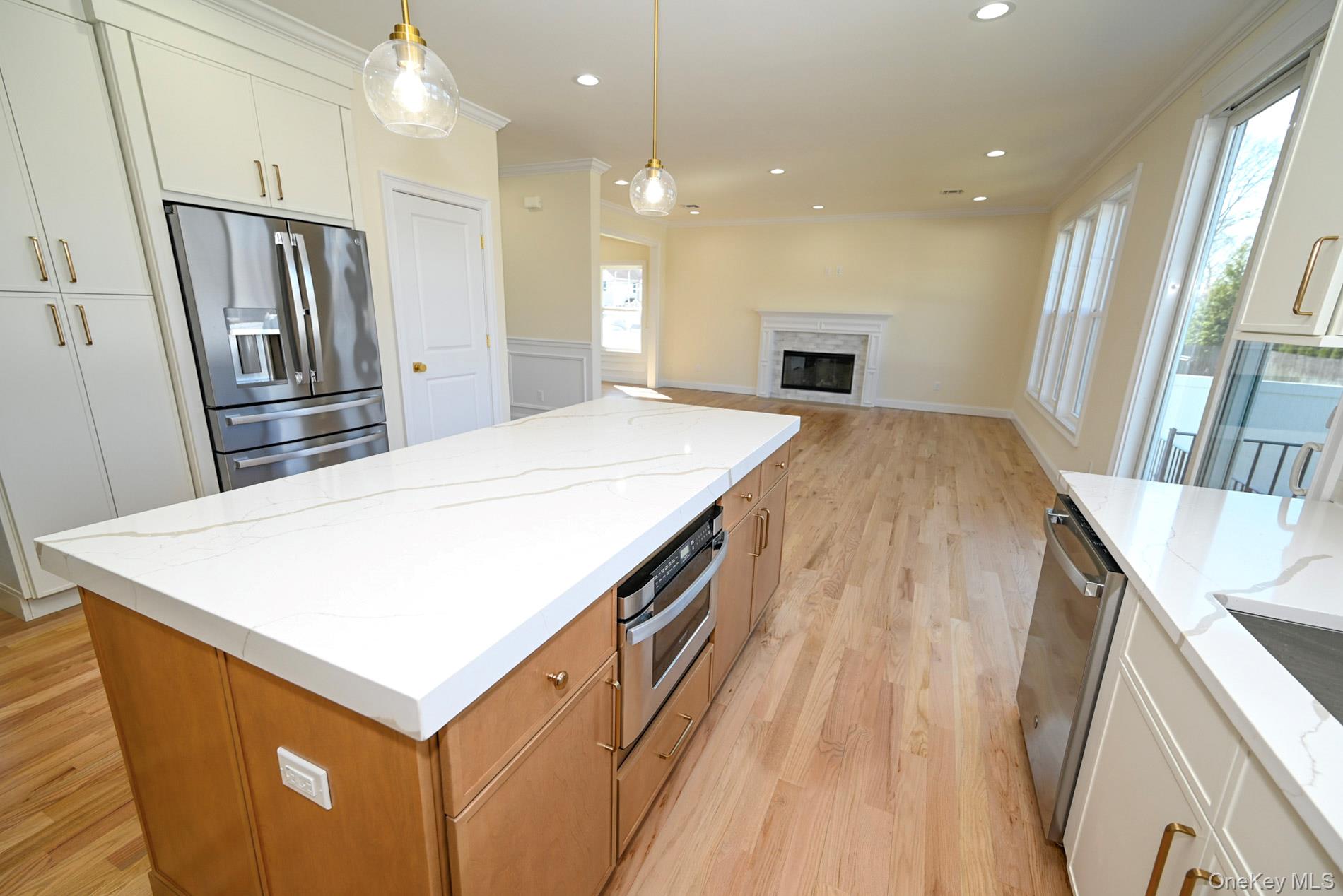 1772 Rose Street Merrick, NY 11566 - Photo 34 of 35 a view of kitchen with sink microwave and refrigerator