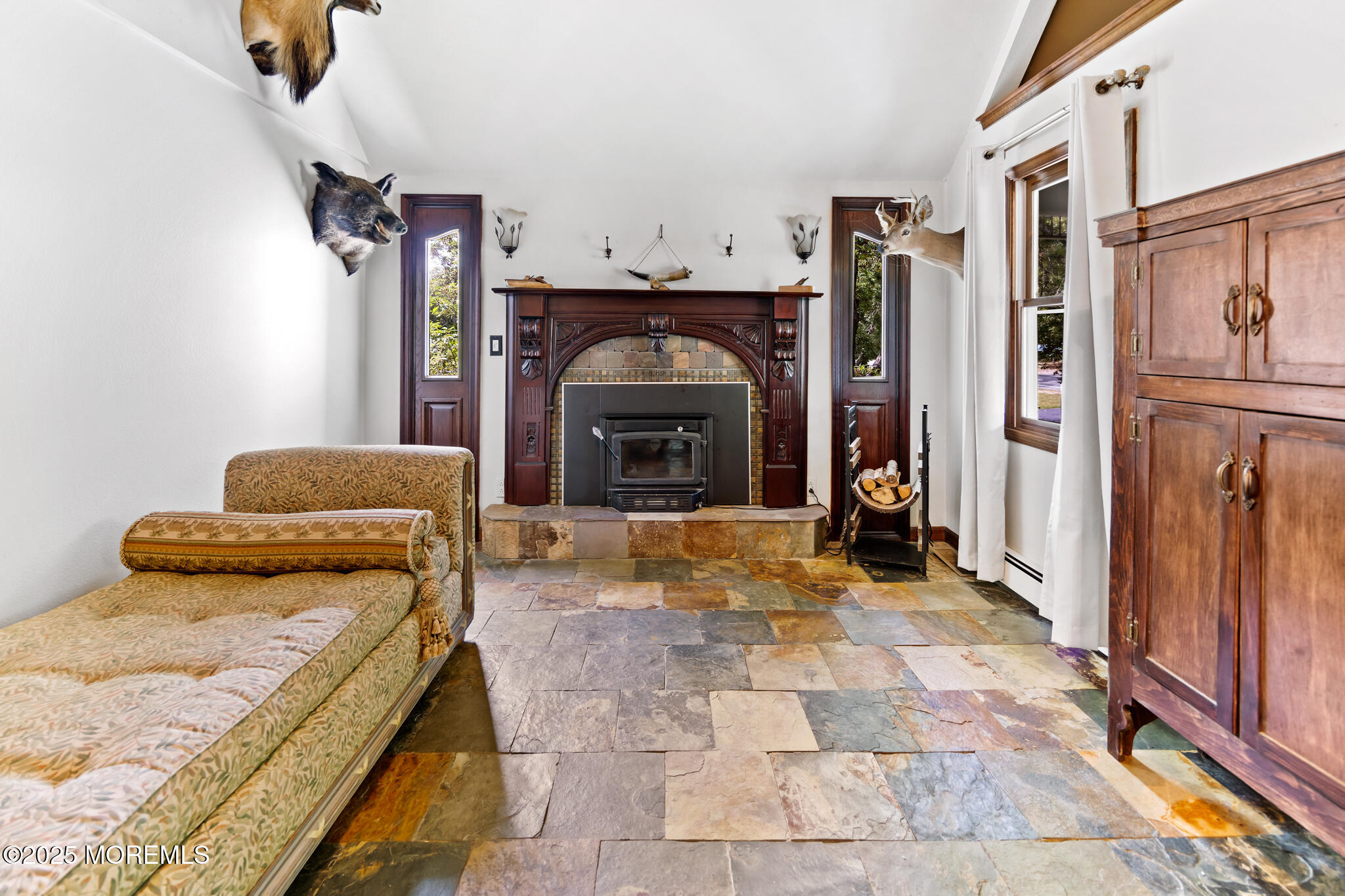 1069 East Veterans Highway Jackson, NJ 08527 - Photo 11 of 65 a view of living room with furniture and a fireplace
