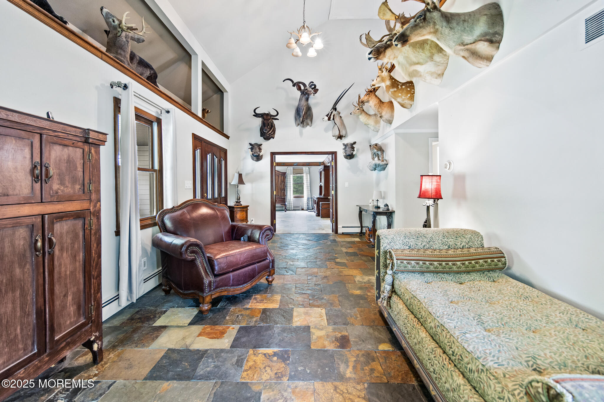 1069 East Veterans Highway Jackson, NJ 08527 - Photo 12 of 65 a living room with furniture flowerpot and wooden floor