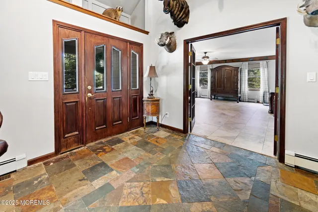 a kitchen with stainless steel appliances granite countertop a sink stove and microwave