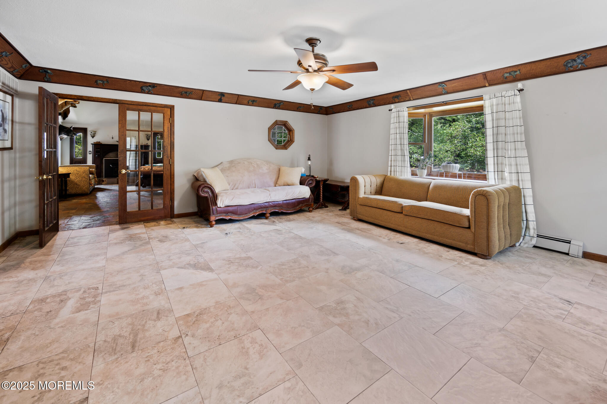 1069 East Veterans Highway Jackson, NJ 08527 - Photo 16 of 65 a living room with furniture and a large window