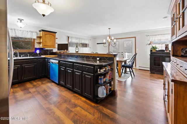 a bed sitting in a bedroom and window