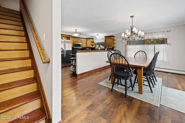 a bathroom with a toilet sink and a mirror