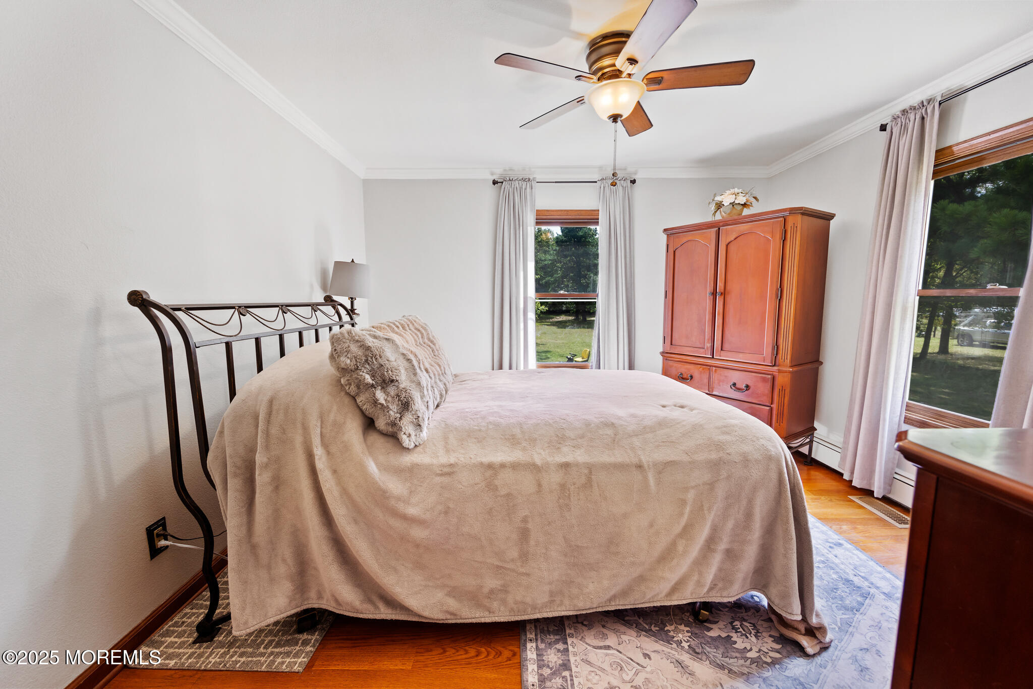 1069 East Veterans Highway Jackson, NJ 08527 - Photo 27 of 65 a bed sitting in a bedroom and window