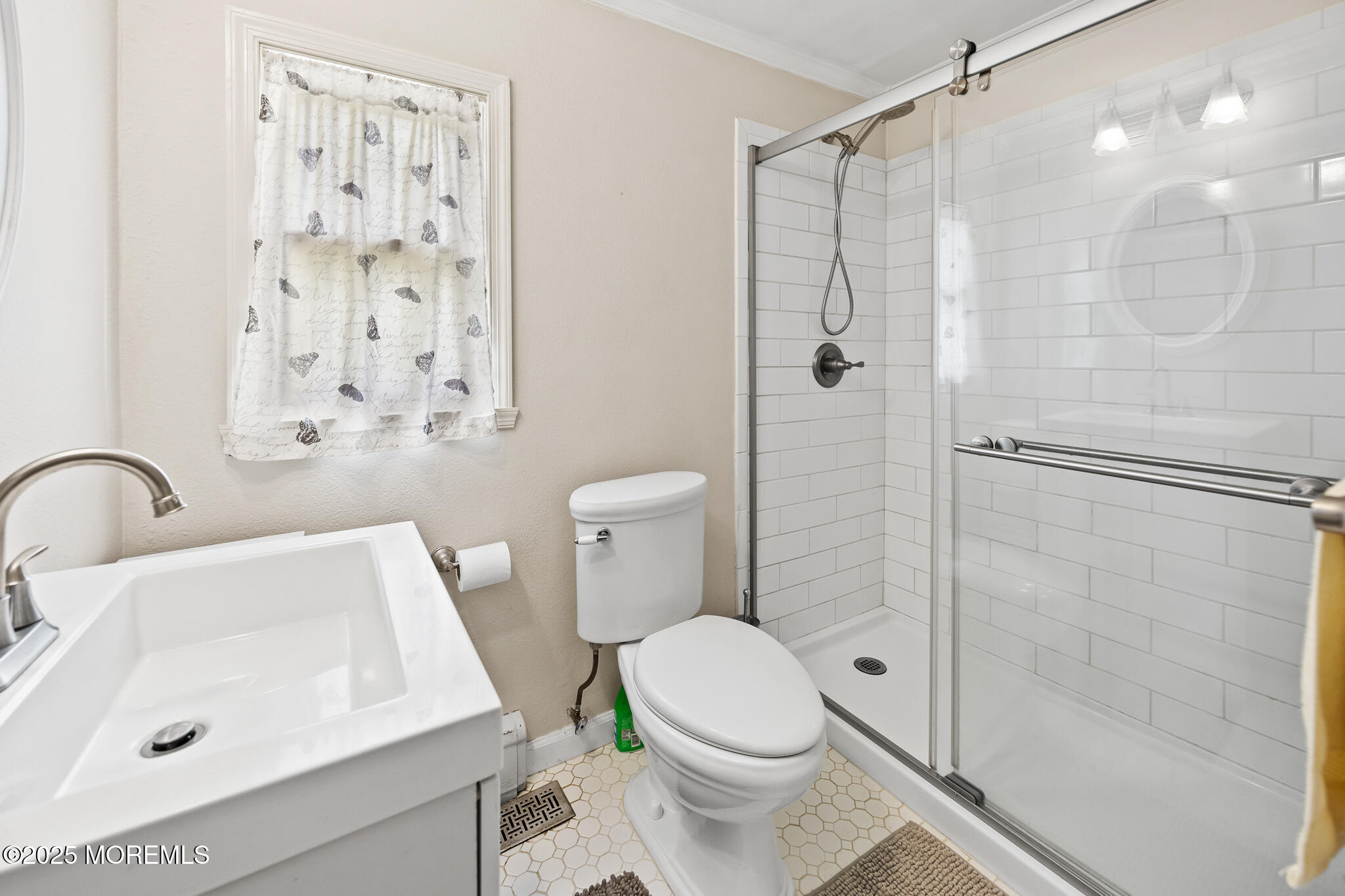 1069 East Veterans Highway Jackson, NJ 08527 - Photo 29 of 65 a bathroom with a sink toilet and shower