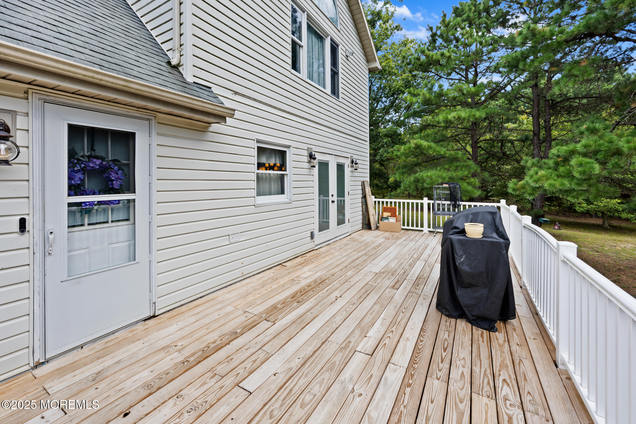 1069 East Veterans Highway Jackson, NJ 08527 - Photo 50 of 65 a view of a wooden deck with a yard