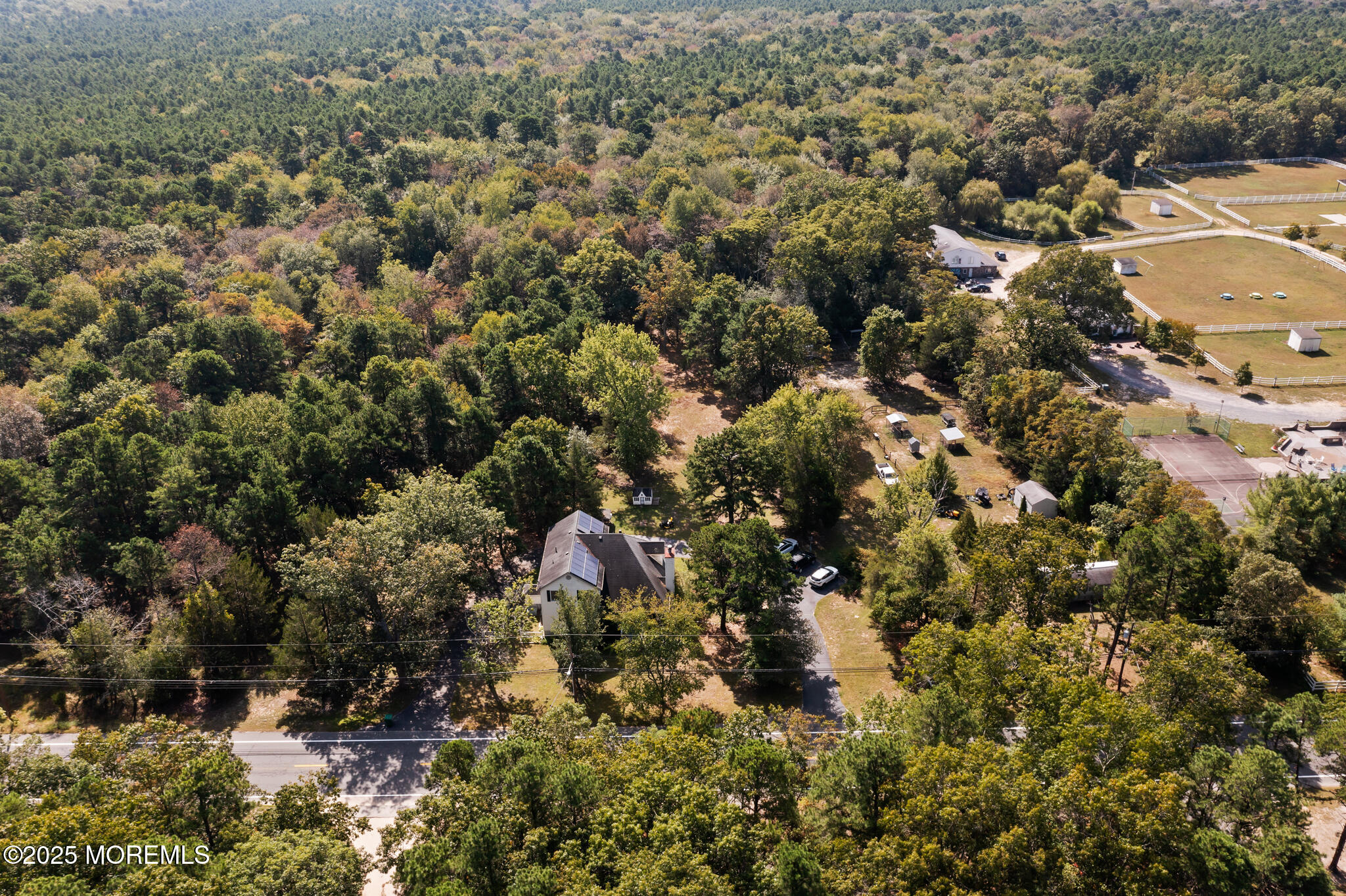 1069 East Veterans Highway Jackson, NJ 08527 - Photo 53 of 65 an aerial view of residential houses with outdoor space and trees