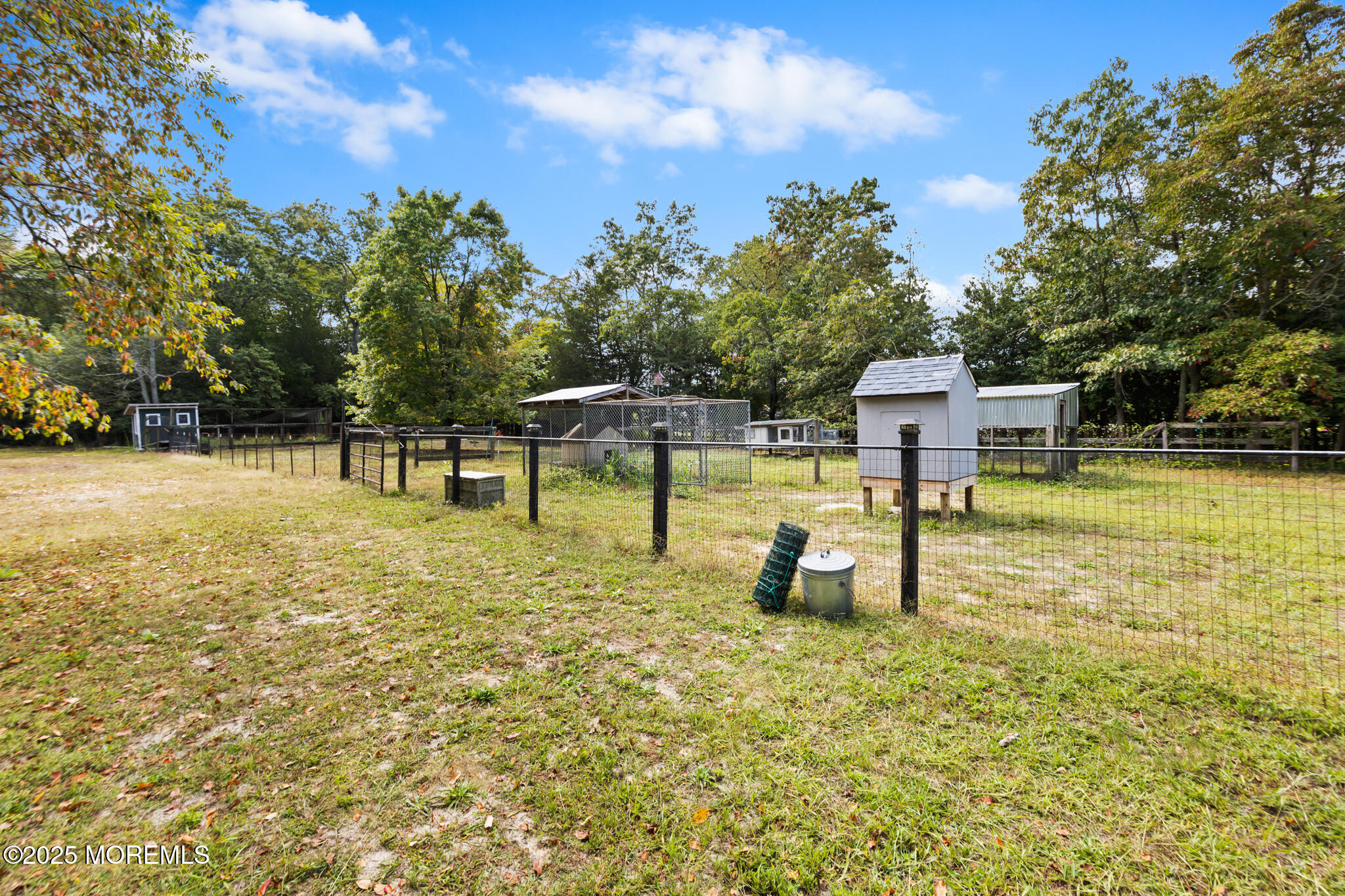1069 East Veterans Highway Jackson, NJ 08527 - Photo 59 of 65 a view of a swimming pool with a bench