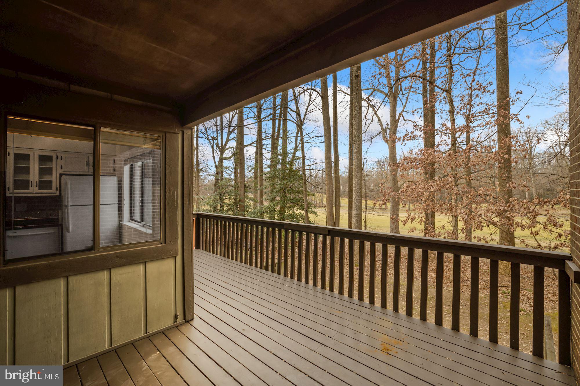 2158 Glencourse Lane Reston, VA 20191 - Photo 12 of 31 Kitchen windows looking over deck and golf course