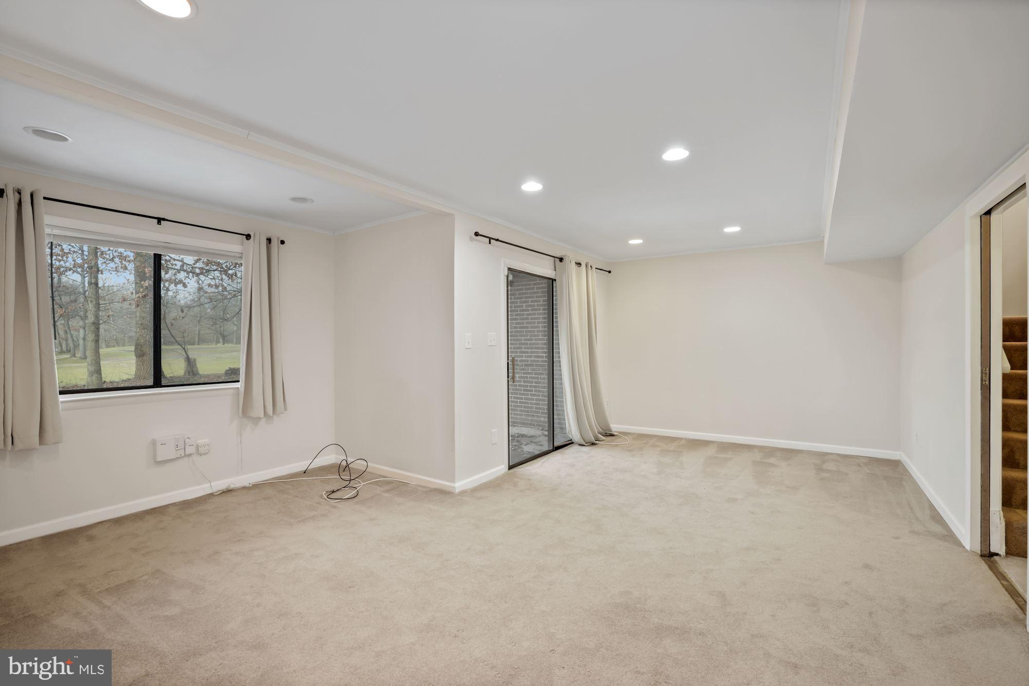 2158 Glencourse Lane Reston, VA 20191 - Photo 20 of 31 Lower level family room