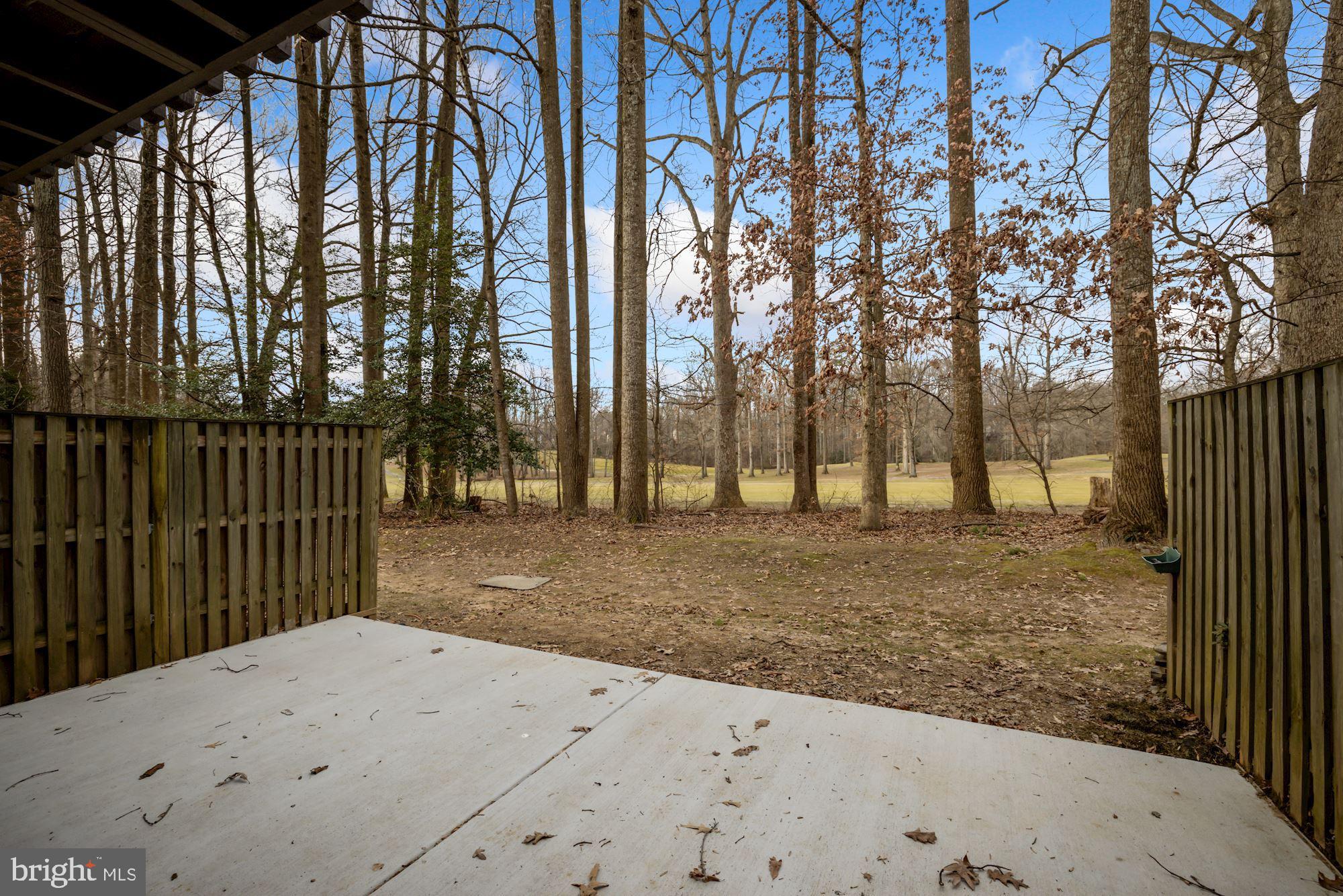 2158 Glencourse Lane Reston, VA 20191 - Photo 25 of 31 Rear view of golf course from lower level patio