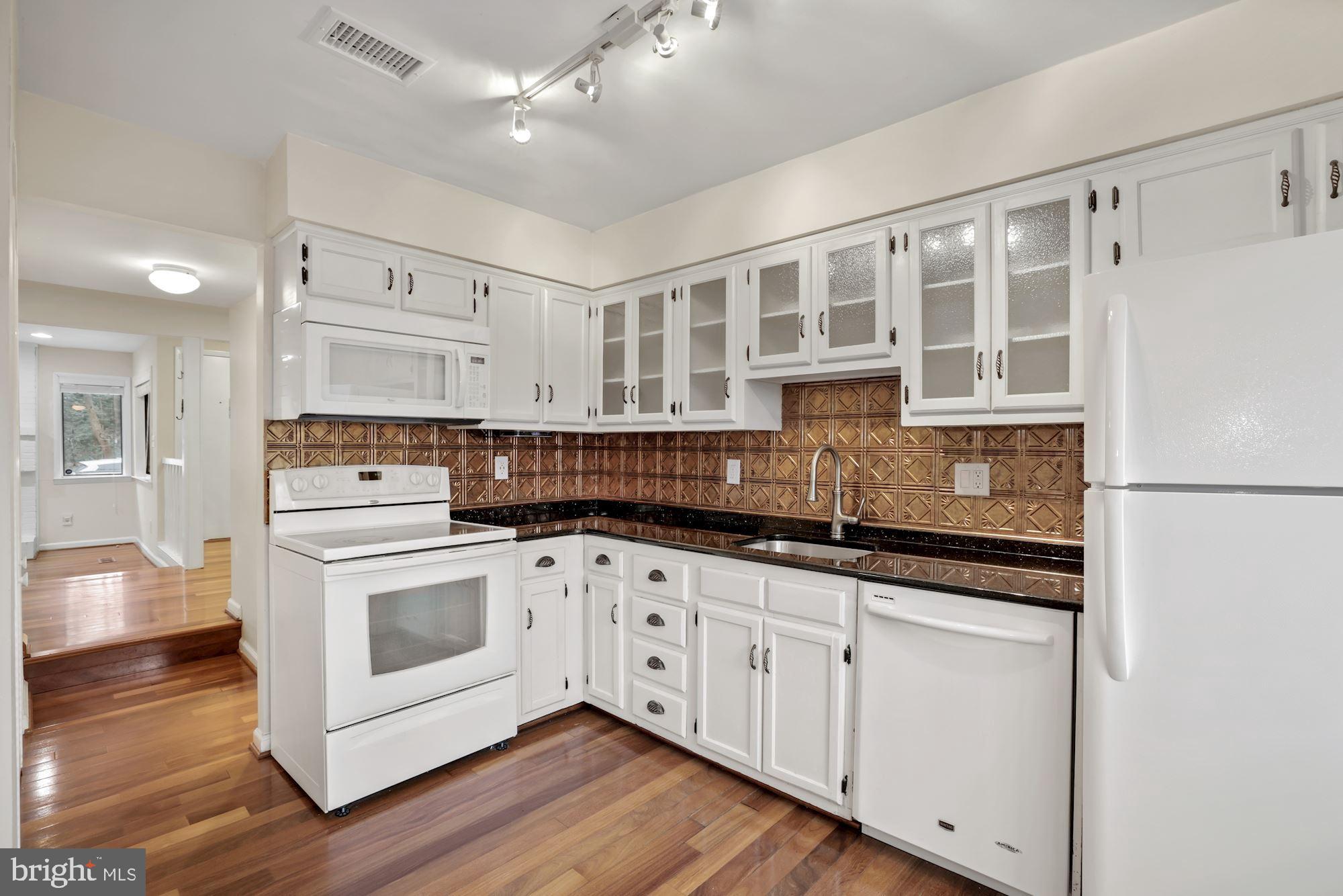 2158 Glencourse Lane Reston, VA 20191 - Photo 8 of 31 Kitchen to pantry
