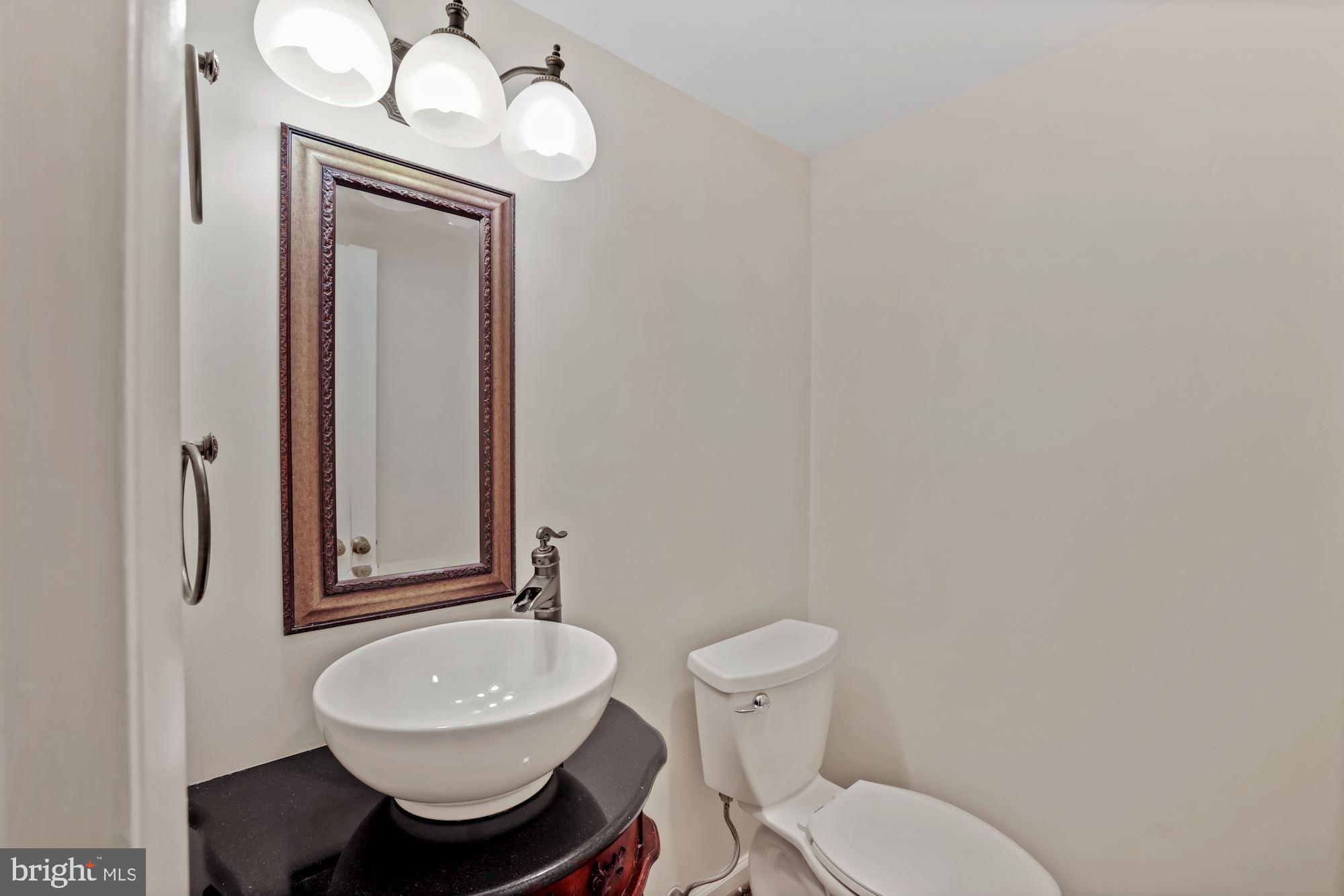2158 Glencourse Lane Reston, VA 20191 - Photo 10 of 31 Half bath on main floor