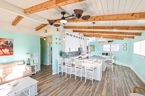 a bed room with a bed and a television