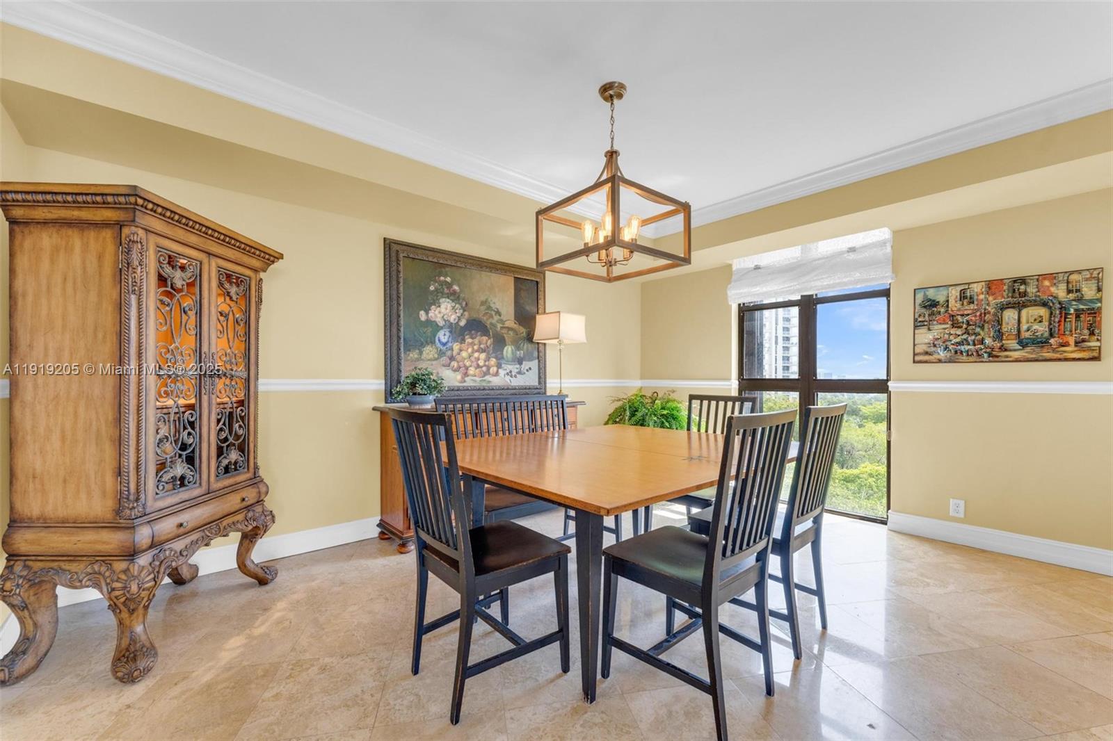 2000 Towerside Terrace, Unit 702 Miami, FL 33138 - Photo 12 of 37 a view of a dining room with furniture window and wooden floor