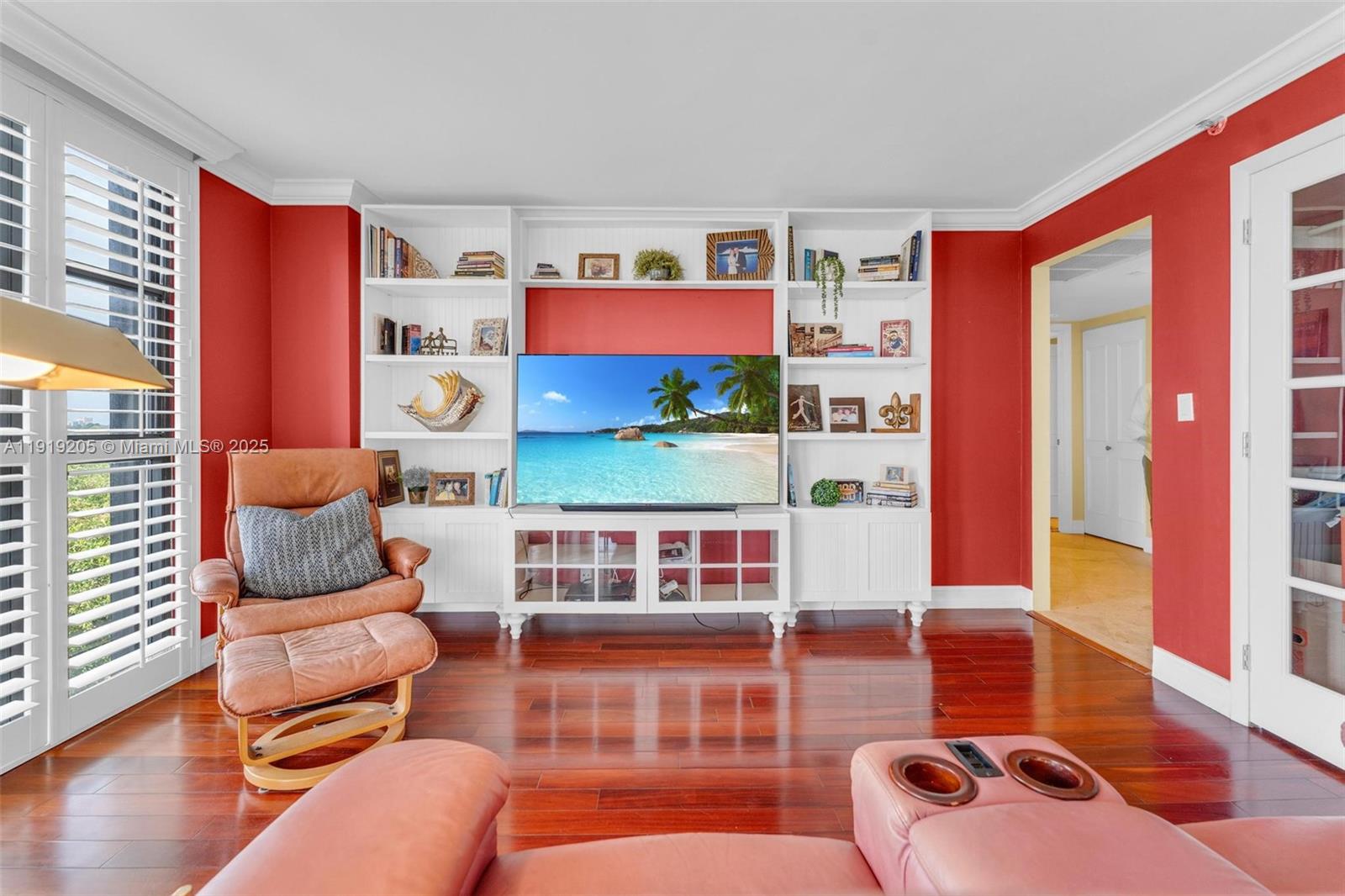 2000 Towerside Terrace, Unit 702 Miami, FL 33138 - Photo 15 of 37 a living room with furniture a rug and a window