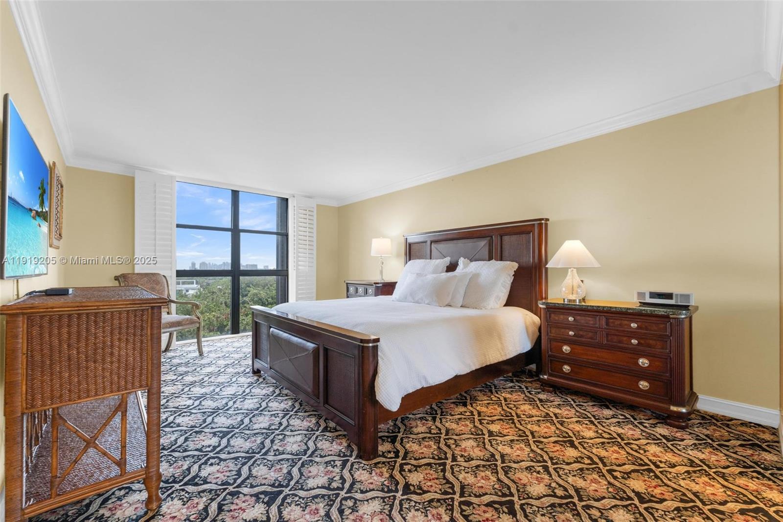 2000 Towerside Terrace, Unit 702 Miami, FL 33138 - Photo 18 of 37 a bedroom with a bed and window