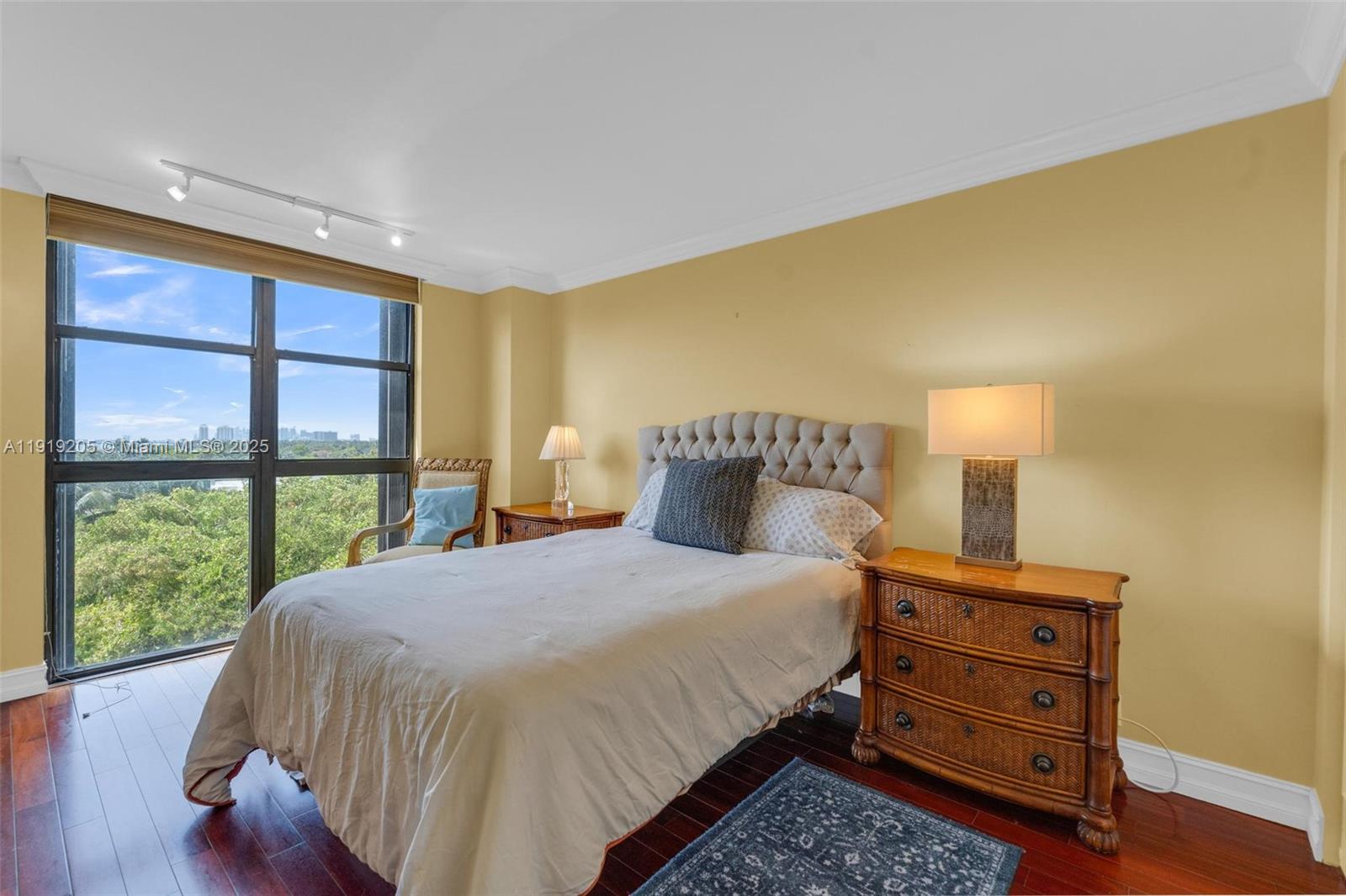 2000 Towerside Terrace, Unit 702 Miami, FL 33138 - Photo 20 of 37 a bedroom with a bed and a window