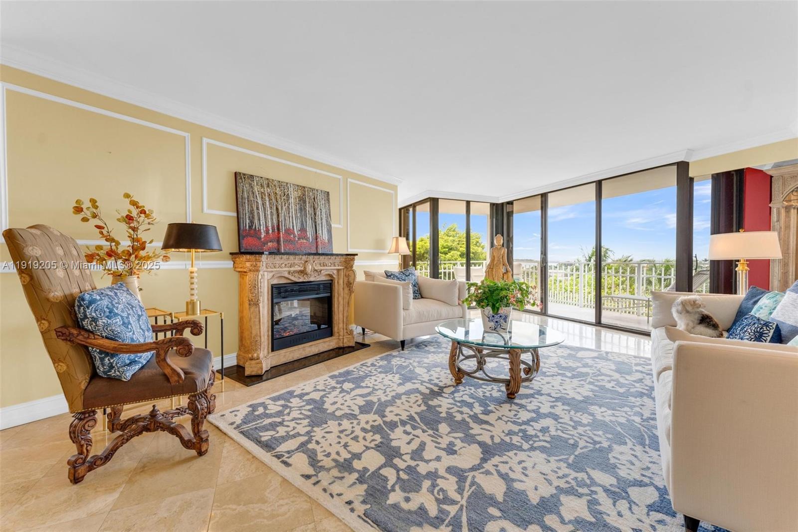 2000 Towerside Terrace, Unit 702 Miami, FL 33138 - Photo 3 of 37 a living room with furniture and a fireplace