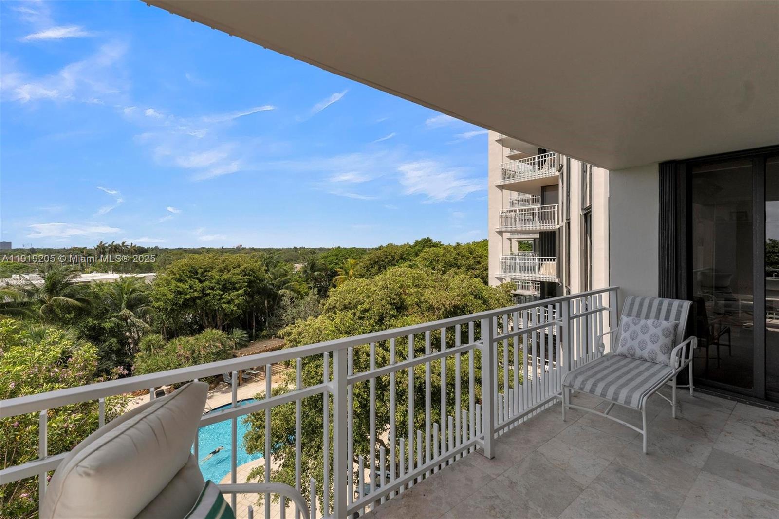 2000 Towerside Terrace, Unit 702 Miami, FL 33138 - Photo 33 of 37 a view of a building from a balcony