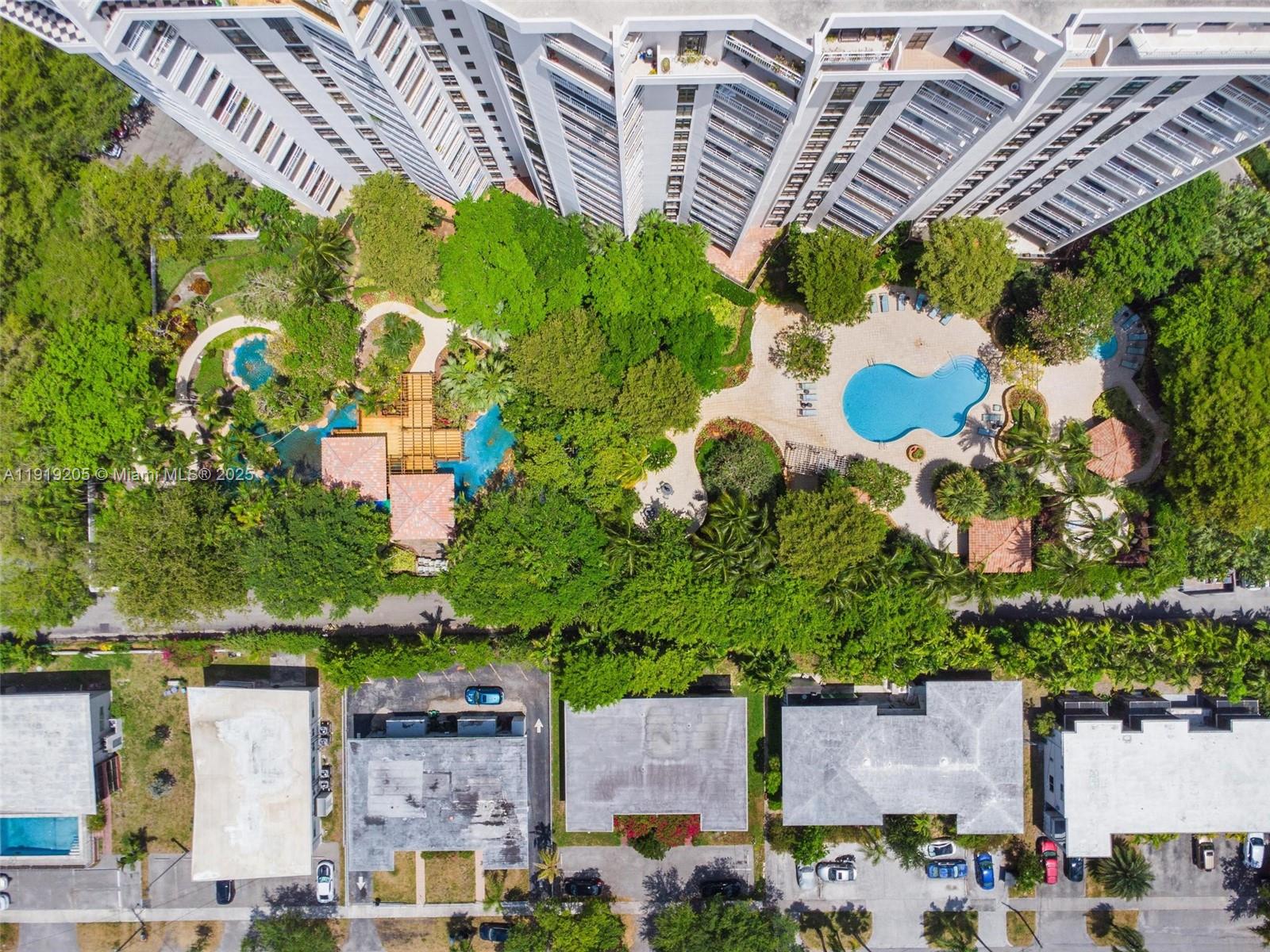 2000 Towerside Terrace, Unit 702 Miami, FL 33138 - Photo 35 of 37 an aerial view of residential houses and car parked