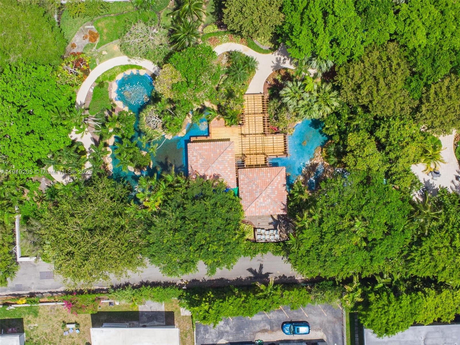 2000 Towerside Terrace, Unit 702 Miami, FL 33138 - Photo 36 of 37 an aerial view of residential house with outdoor space and trees all around