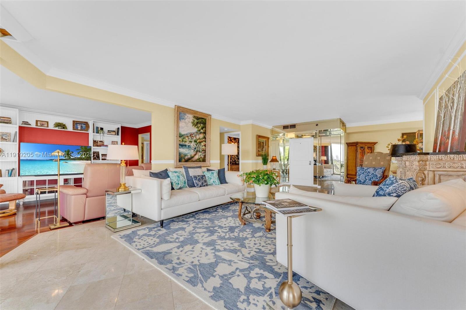 2000 Towerside Terrace, Unit 702 Miami, FL 33138 - Photo 4 of 37 a living room with furniture and a large window