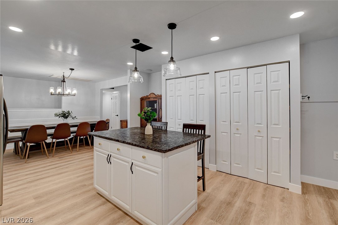 3765 Berkeley Street Logandale, NV 89021 - Photo 30 of 87 This bright kitchen with a central island flows into a spacious dining area.