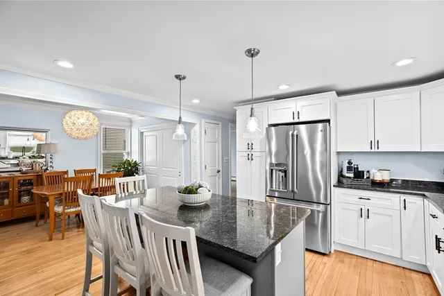 a kitchen with counter space appliances and cabinets
