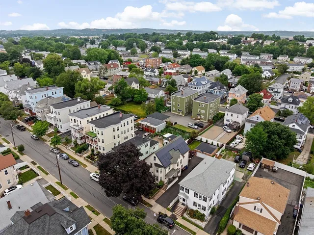 an aerial view of a city with lots of residential buildings