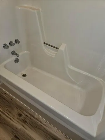 a bathroom with a bathtub
