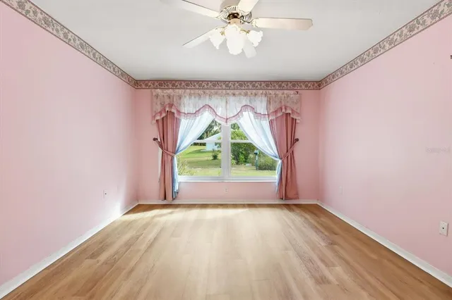 a close view of a utility room with dryer and washer