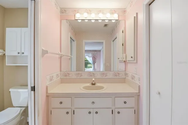 a living room with a large window with outer view