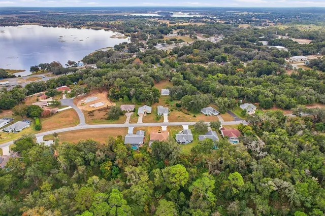 a large kitchen with stainless steel appliances lots of counter top space