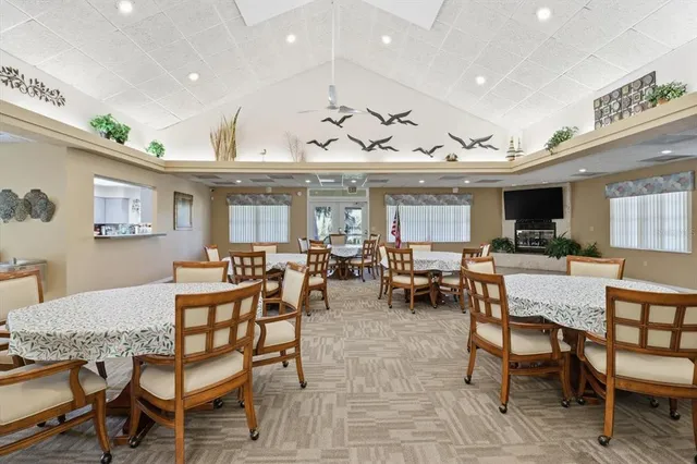 a view of a backyard with swimming pool