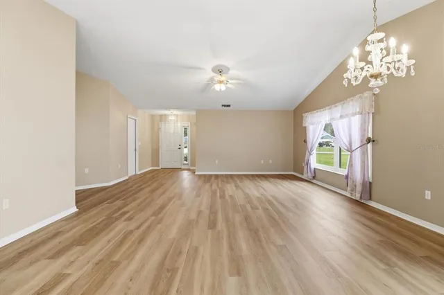 a kitchen with a stove top oven sink and cabinets