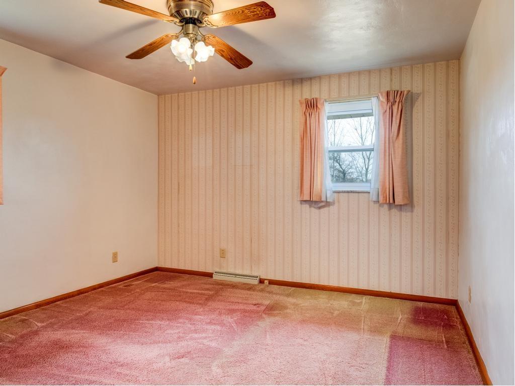 129 Wall Street Rochester, PA 15074 - Photo 12 of 24 an empty room with windows and fan
