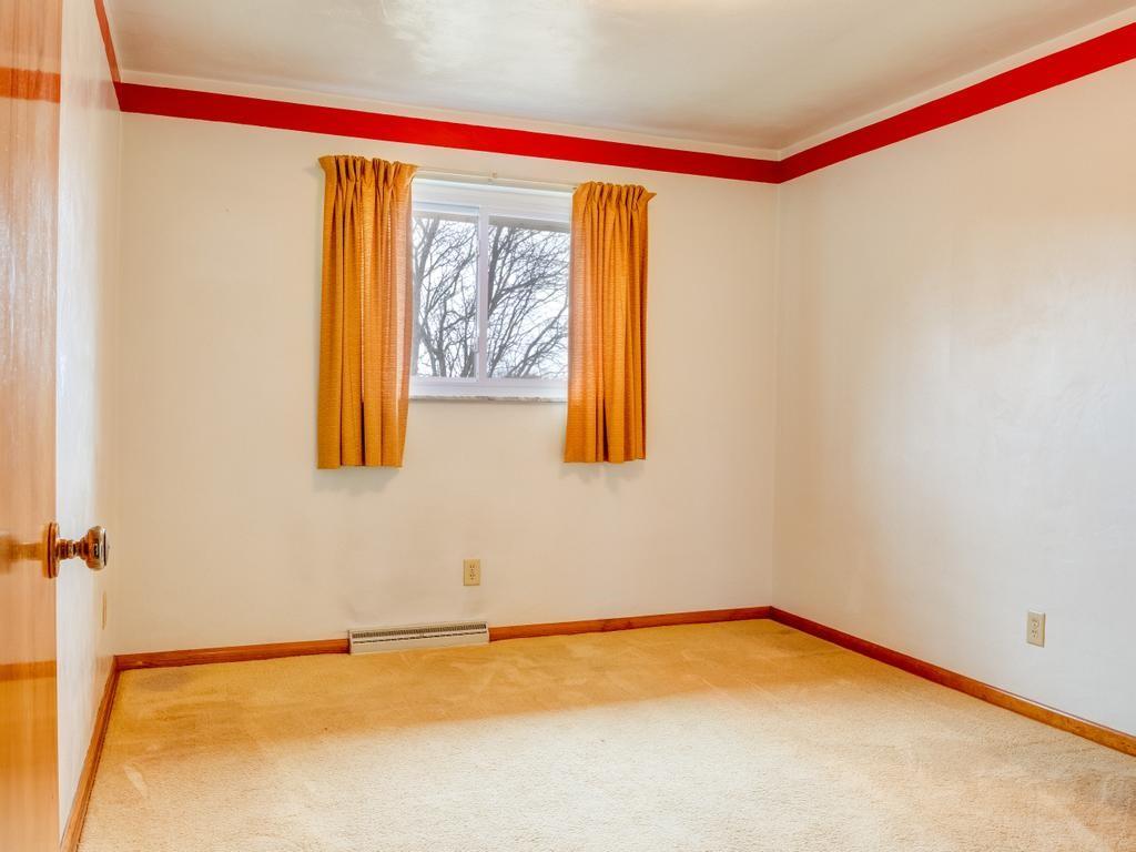 129 Wall Street Rochester, PA 15074 - Photo 14 of 24 a view of a room with blue walls and a window