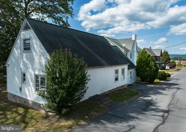 a kitchen with stainless steel appliances granite countertop a sink and a stove