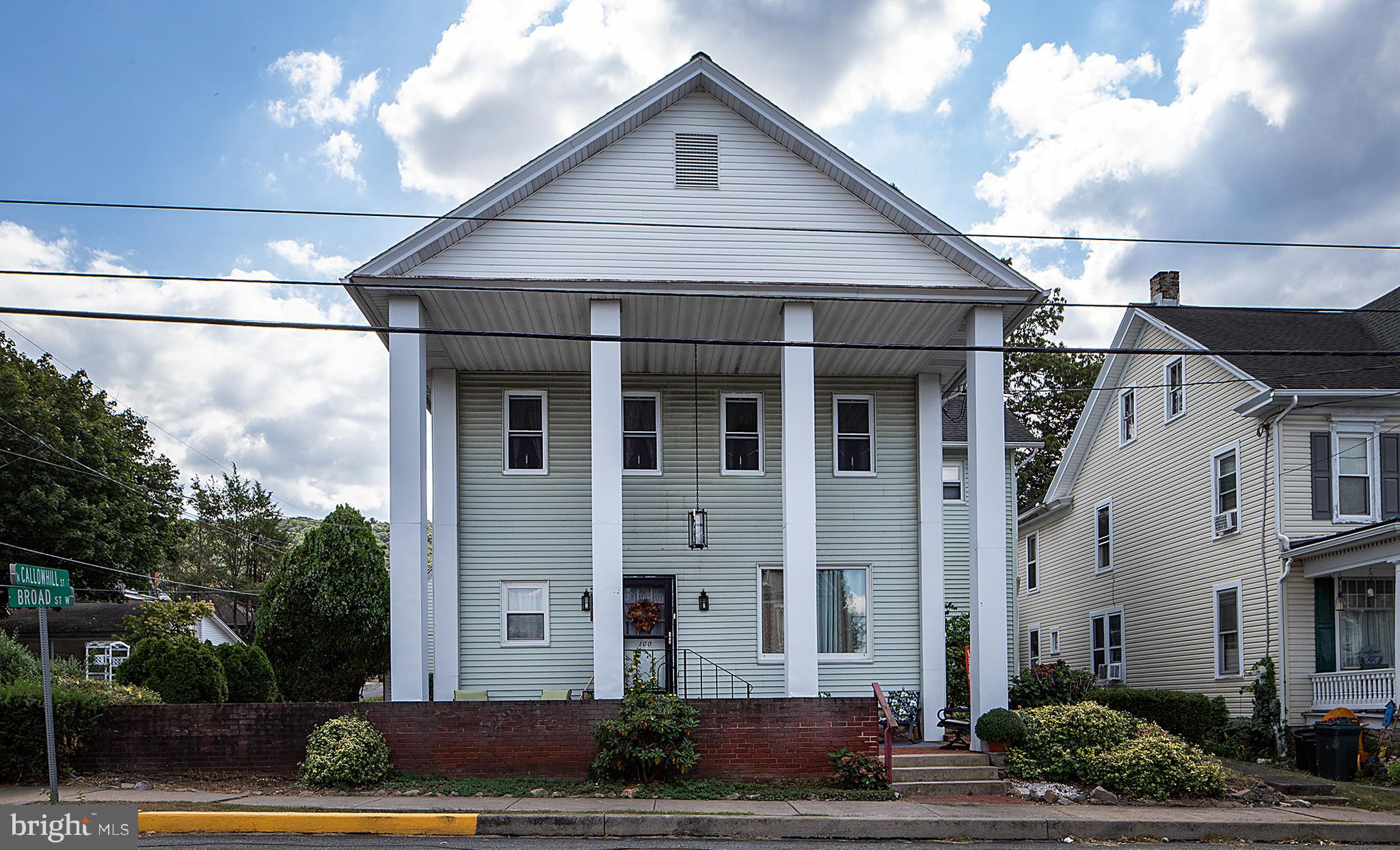 100 West Broad Street Elizabethville, PA 17023 - Photo 2 of 89 a front view of a house with garden