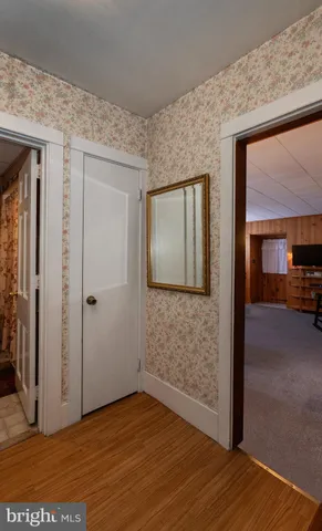 a view of a hallway with workspace